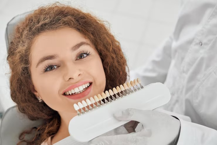 Porcelain veneer for treating uneven or misshaped teeth